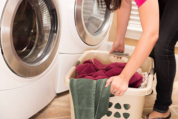 The Heavy Laundry Basket: Why Bending and Twisting with Wet Clothes is a Disc Herniation Trigger