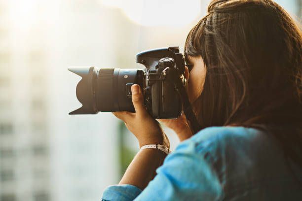 Photographer's Neck: How Holding Heavy Lenses Causes Mid-Back and Upper Trapezius Knots