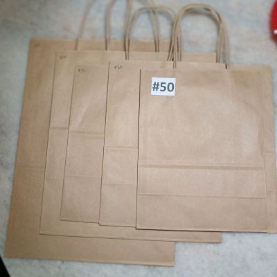 Twisted handle paper bag
