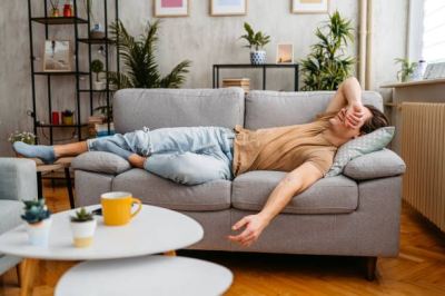 The Couch Trap: Why Soft Sofas Ruin Your Lumbar Spine and How to Stand Up Efficiently
