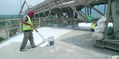 Application of Bostik base waterproofing membrane in progress