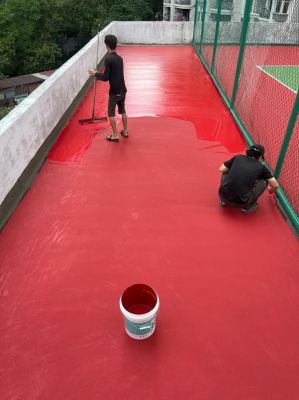 Application of 2nd coat of acrylic colour coating in progress