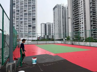 Application of 1st coat of acrylic co;our coating in progress