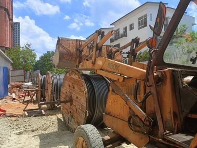 Backhoe rental Melawati @cable