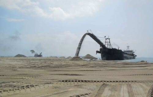 Sand carriers discharging sand for a reclamation in Johor-01