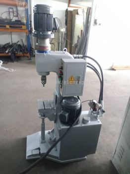 HYDRAULIC RIVETING MACHINE