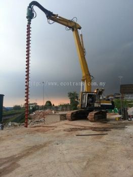 Excavator w Auger Assembly