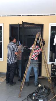 Progress done before & after:(Double Storey House)-1)To fabrication and install custom make powder coated new mild steel expended mesh panel door grille with handle key lock - Shah Alam