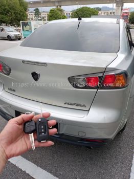 duplicate Proton Inspira car key with remote control