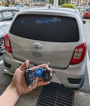 Professional locksmith duplicating car key remote