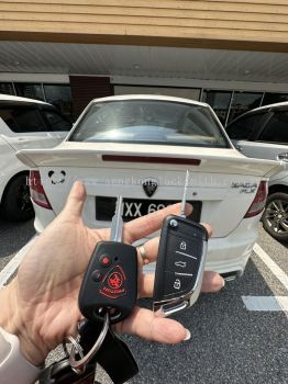 Professional locksmith duplicating car key remote