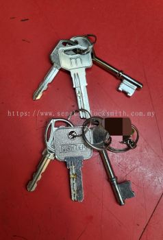 Professional locksmith duplicating keys