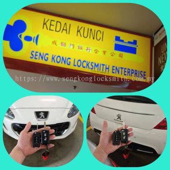 pendua kunci remote kereta Peugeot 