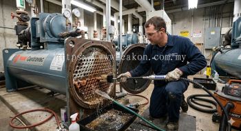 Chiller scale and sediment removal