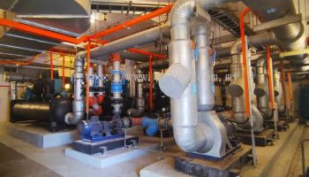 Retrofitting centralized chilled water systems