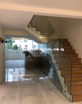 Sleek and Sturdy Glass Railing for a Modern and Elegant Condominium