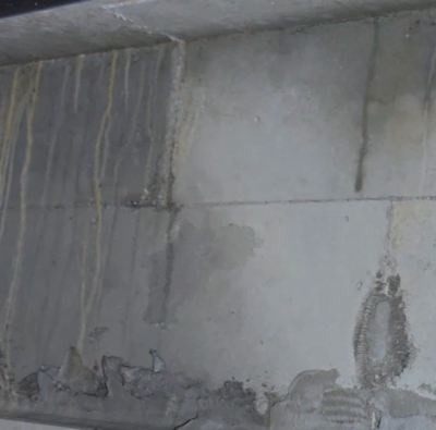 condo upper unit toilet slab soffit water leaking 